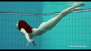 Bikini girl strips in the pool for skinny dipping fun
